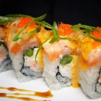 Baked Salmon Roll · 8 pieces. Crab, cream cheese, carrots topped with salmon, fresh roe, and sweet eel sauce.