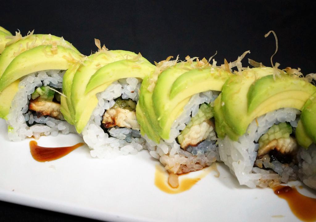 Caterpillar Roll · 8 pieces. Baked eel, cucumber topped with avocado, dry fish flakes, and sweet eel sauce.