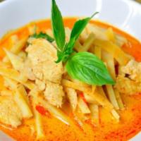 Red Curry with Jasmine Rice · Bamboo shoots, bell peppers and basils in medium red curry with coconut milk.