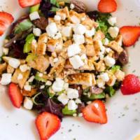 Greek Salad · Grilled chicken breast, lettuce, Roma tomatoes, red onion, feta cheese, Kalamata olives, pep...