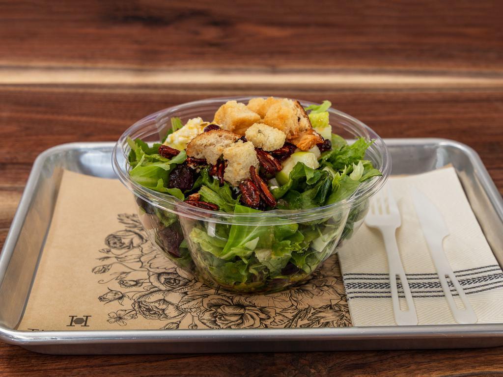 Fruit and Nut Salad · Spring mix and romaine layered with apples, dried cranberries, candied pecans, onions, goat cheese, croutons and our original honey jalapeño vinaigrette. Add chicken for an additional charge.