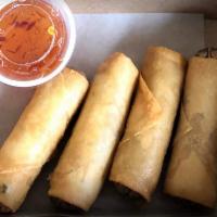 Crispy Egg Roll (4) · Carrot, celery, cabbage, and glass noodles wrapped in rice paper, served with sweet and sour...