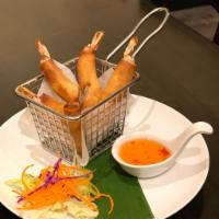 Crispy Shrimp Roll (5) · Shrimp wrapped with wheat paper, deep-fried.