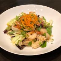 Lemongrass Seafood Salad · Shrimp, squid, scallop, and mussel tossed with lemongrass, onion, tomato, fresh mint, and ch...
