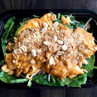 Phra Ram (Peanut) · Stir-fried your choice of protein with homemade peanut sauce, served over baby spinach and b...