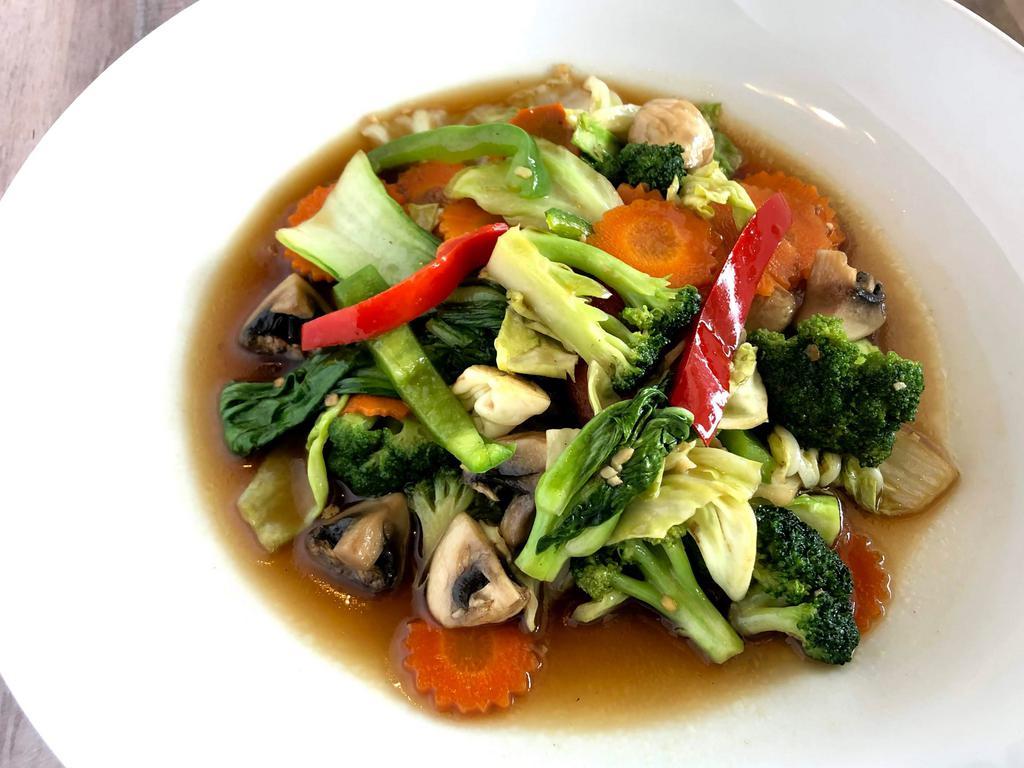 Vegetable Delight · Stir-fried choice of protein with broccoli, baby bok choy, carrot, mushroom, Napa cabbage, and bell pepper in garlic brown sauce.