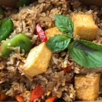 Basil Fried Rice · Stir fried rice with egg, Thai basil leaves, bell pepper, garlic and onion.