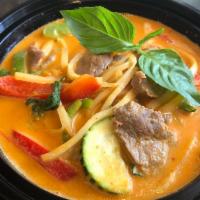 Red Curry · Red curry. Spicy curry with coconut milk, bamboo shoot, bell pepper, zucchini, and Thai basi...