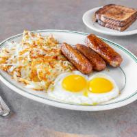 #1. Traditional Breakfast Combo · 2 eggs, choice of bacon, sausage patty or links, German sausage or ham. Served with hash bro...