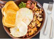 #8. Corned Beef Hash and Eggs Combo · All-time favorite. Grilled corned beef served with 2 eggs, hash browns and your choice of to...