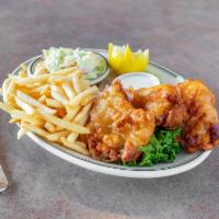 Housemade Fish and Chips · White, moist and flaky hand-dipped cod served with tartar sauce and lemon wedges.