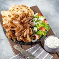 Chicago Gyro Platter · Our delicious Lamb, beef, or chicken with fresh Greek Salad, Flat gyro pita  bread and tradi...