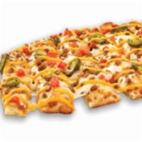 Triple NachoStix Topperstix · Our delicious Original Topperstix topped with ground beef, pepper jack, fire-roasted jalapen...