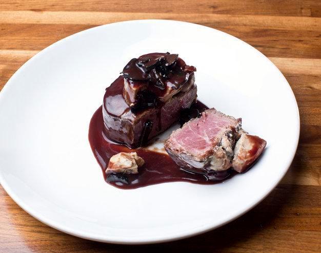 Tournedos Rossini · Signature, Seared filet mignon topped with foie gras not seared foie gras very important, shallots, port red wine truffle sauce. Gluten-free.