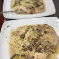 Chicken Charchifini · Sauteed white wine lemon sauce with artichoke hearts and mushrooms.
