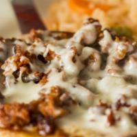 Chori Pollo · Grilled marinated chicken and chorizo Mexican sausage topped with cheese sauce. Served with ...