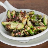 Brussel Sprouts · Roasted with Seasonal Nuts & Cranberries tossed in a White Balsamic.