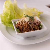 Lettuce Wrap · Stir fried minced chicken, shiitake mushrooms, water chestnuts and topped with red bell pepp...
