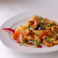 Cashew Nuts Delight · Cashew nuts, onions, green onions, zucchini, carrots and bell peppers in a mild chili paste ...