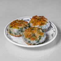 25. Pan-Fried Chives Dumpling · Xiang jian jiu cai guo.

