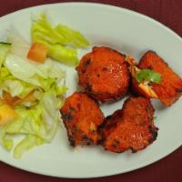 4. Chicken Tikka · Pieces of spring chicken lightly spiced and grilled in a tandoori oven.