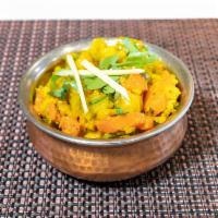 82. Vegetable Curry · Vegetables seasoned with curry powder, turmeric, salt, pepper and red pepper flake and cooke...