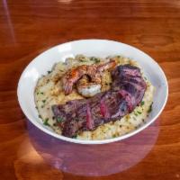 Surf and Turf Mac  · Skirt steak, grilled prawns, house cheese sauce, and campanelle pasta.
