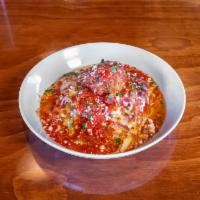 Lasagna Bolognese · Prosciutto, brisket and pork meatball, ricotta, mozzarella, provolone, tomato sauce, and pec...