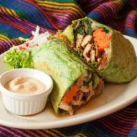 Cesars Wrap · A spinach or tomato tortilla stuffed with chicken breast, turkey or steak. Loaded with cauli...