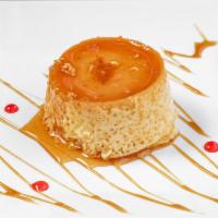 Flan · Vanilla infused custard, drizzled with caramel sauce.