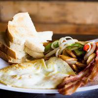 Eggs to Order · 3 eggs any style served with Maggie's potatoes and your choice of bacon or sausage and sourd...