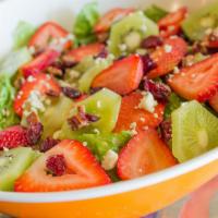 Strawberry Salad · Romaine lettuce, strawberries, kiwis, candy pecans, dry cranberries and crumble blue cheese ...