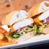 Blackened Chicken Sandwich · Blackened chicken breast with melted cheddar cheese, lettuce, tomatoes and onions with chipo...