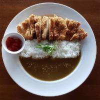 Katsu Curry · Served with breaded chicken breast, Japanese curry and crunchy garlic.