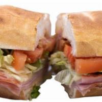 Louie's Ham and Swiss Sandwich · Black Forest ham, Swiss cheese, lettuce, tomato and Dijon mayonnaise.