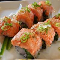 Crazy Yellowtail Roll · Yellowtail and Jalapeno top with Seared Spicy Yellowtail, Sea Salt and Scallion