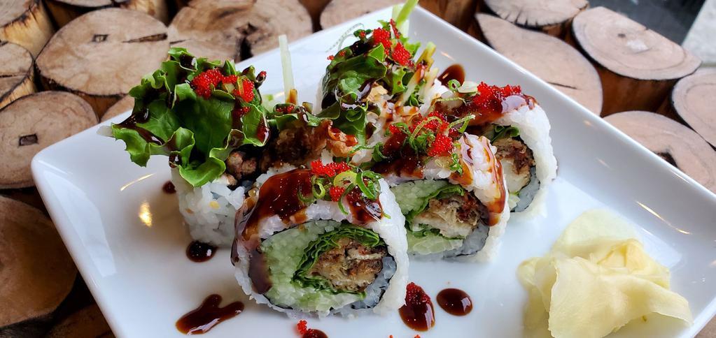 Spider Roll  · Fried Soft Shell Crab, Avocado, Cucumber, Lettuce and Mayo top with Eel Sauce, Scallion and Caviar