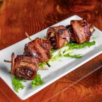 Bacon Wrapped and Gorgonzola Stuffed Dates · 4 pieces. Gluten Free.

