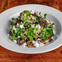 Turkey Cranberry Salad · Candied walnuts, goat cheese, balsamic vinaigrette and mixed greens. Gluten free.

