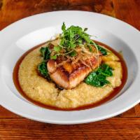 Bourbon and Brown Sugar Seared Salmon · Cheese grits, sauteed spinach and crispy shallots.
