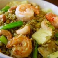 Pineapple Chicken and Shrimp Fried Rice · Curry flavored rice with pineapple, chicken, shrimp, scallion and cashews. Hot and spicy.