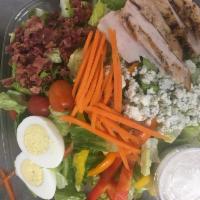 Cobb Salad - Pita Bread  · Mixed greens, onion, blue cheese crumbles, tomatoes, bacon, hard boiled egg, chicken & blue ...