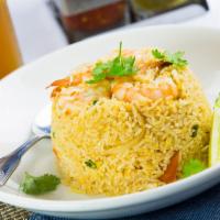 44. Pineapple Fried Rice · Shrimp and chicken with egg, carrot, pineapple, curry powder, cashew nut, and Chinese sausage.