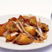 Homefries · Yukon potatoes, onions, peppers and herbs.