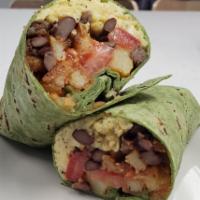 Breakfast Burrito · Our housemade Chili, eggs, home fries, tomatoes and cheese wrapped in a spinach wrap.