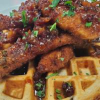 Chicken & Waffle ·  Buttermilk Fried Chicken & Seasonal Oat Waffle served with Maple Syrup. 