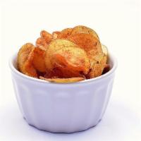 Chickadee Chips and Dipping Sauce · House-made crispy potato chips served with a dipping sauce.