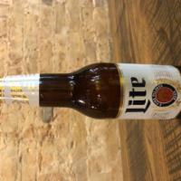 Miller Lite · Miller Lite is a 4.2% ABV American light pilsner beer sold by MillerCoors of Milwaukee, Wisc...