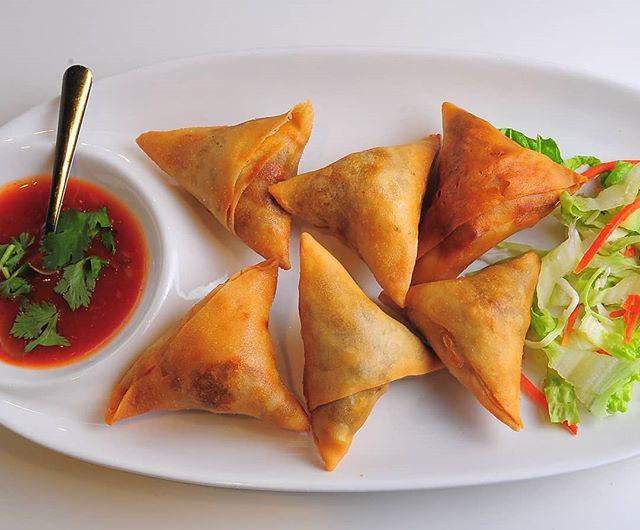 4. Samosa ( 5 pcs ) · 5 pieces. Crispy pastry filled potatoes, onions and spices with chili sauce.