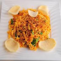 13. Spicy noodle salad · Flour noodles, tossed with shrimp powder, fried garlic, fresh onion, cucumber, cabbage, cila...